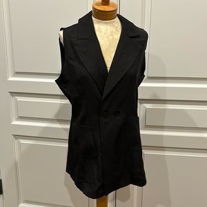 Sleeveless blazer with flattering fitted shape